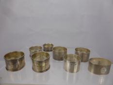 Seven Silver Napkin Rings, of various hallmarks, approx 176 gms.