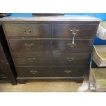 An Antique Stained Oak Graduated Chest of Drawers, two short and three long with brass swan neck