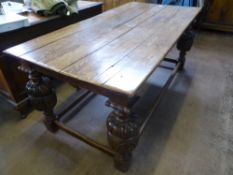 An Oak Reproduction Dutch Refectory Table, with decorative bulbous carved legs with straight