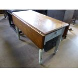 A Pine Drop Leaf Table, with celadon painted legs, approx 104 x 92 x 69 cms.