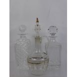 Two Cut Glass Decanters together with one Continental hand painted Carafe. (3)