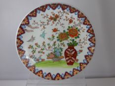 A 20th Oriental Chinese Charger, hand painted with chrysanthemum, prunus and a bowl of pomegranates,