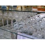 A Large Quantity of Cut Glass, including twelve long stem wine glasses, six short stem glasses,