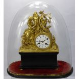 A 19th Century French Henri Marc Gilt Mantle Clock, depicting a young woman carving initials into