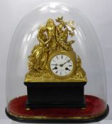 A 19th Century French Henri Marc Gilt Mantle Clock, depicting a young woman carving initials into