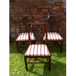 Six Mahogany Dining Chairs of 18th Century Design, with pierced back splats, on square legs and