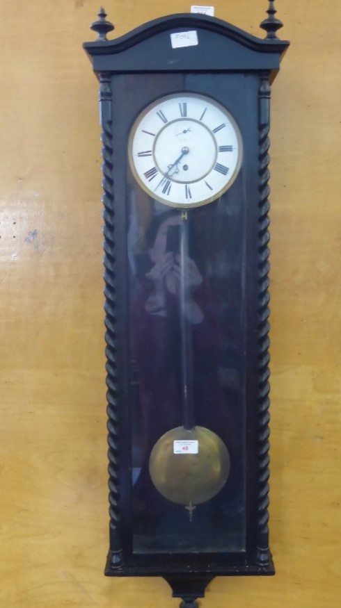 A Viennese Wall Clock, in an ebony case with white enamel face and Roman dial, approx 100 x 28 - Image 2 of 2