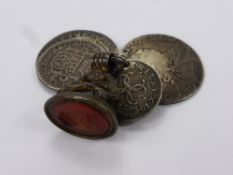 An Antique Cornelian Fob Seal, depicting a learned gentleman together with miscellaneous coins