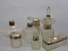 A Quantity of Cut Glass and Silver Perfume Bottles, and nine vanity jars.