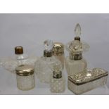 A Quantity of Cut Glass and Silver Perfume Bottles, and nine vanity jars.