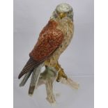 A Goebel Porcelain Figure of a Kestrel, impressed mark CV110-1969, together with a hand painted