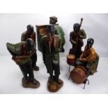 A Collection of Jazz Band Figures, including a pianist, double bass player, singer, trombonist,