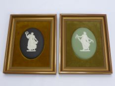 Two Wedgwood Oval Plaques, depicting The Graces, mounted in velvet lined frames, the plaques