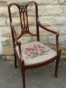 An Edwardian Inlaid Chair, with tapestry seat, on splayed legs.