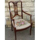 An Edwardian Inlaid Chair, with tapestry seat, on splayed legs.