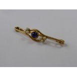 A Lady's 15 Ct Yellow Gold Cabochen Sapphire and Seed Pearl Brooch, wt 5.2 gms., 5.6 mm sapp, 6 x