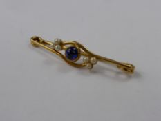 A Lady's 15 Ct Yellow Gold Cabochen Sapphire and Seed Pearl Brooch, wt 5.2 gms., 5.6 mm sapp, 6 x