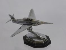 A Vintage Chrome Table Cigarette Lighter, in the form of a jet plane.