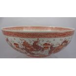 A Chinese Fine Porcelain Bowl, depicting dragon and bird of prey to centre with chasing dragons to