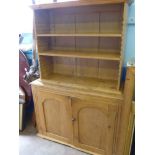 A Vintage Pine Dresser, with two plate shelves and two cupboards beneath, approx 176 x 122 x 44 cms