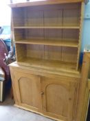 A Vintage Pine Dresser, with two plate shelves and two cupboards beneath, approx 176 x 122 x 44 cms