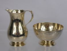 A Solid Silver Cream Jug and Sugar Bowl, Birmingham hallmark, dd 1984 and 1975, mm J.B.C. & S. Ltd.,