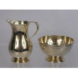 A Solid Silver Cream Jug and Sugar Bowl, Birmingham hallmark, dd 1984 and 1975, mm J.B.C. & S. Ltd.,