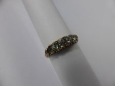 A Lady's Antique 9 Ct Yellow Gold 7 Stone Diamond Ring. 4 x old cuts, approx 45 pts, 9 x rose