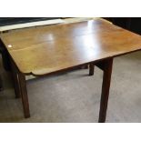 An Antique Mahogany Drop Leaf Dining Table, having split carved corners, on straight legs, approx 75