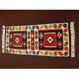 A 20th Century Turkish Tekke Woollen Kilim, multi coloured of geometric design, approx 113 x 50