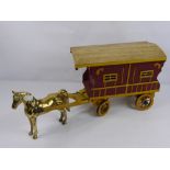 A Brass Cart Horse with a hand made Romany caravan together with another horse-drawn cart. (2)