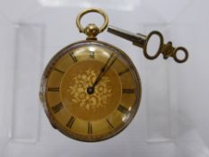 An 18 K Hallmark Lady's Open Face Pocket Watch, the watch having gold floral face with Roman