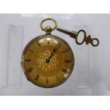 An 18 K Hallmark Lady's Open Face Pocket Watch, the watch having gold floral face with Roman