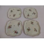 Four Antique Quimper Style Scallop Form Pottery Hand Painted Trays depicting flowers.