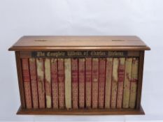 A Collection of Charles Dickens Novels, in the original oak case.