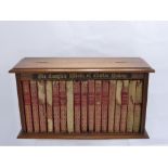 A Collection of Charles Dickens Novels, in the original oak case.