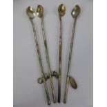 Four Silver Iced Tea Straws, bamboo form handles, with charms to top.