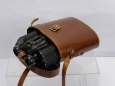 A Pair of Leiberman & Gorz 10 x 40 Binoculars, in the original leather case.