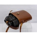 A Pair of Leiberman & Gorz 10 x 40 Binoculars, in the original leather case.