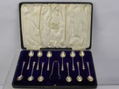 A Set of Twelve Silver Coffee Spoons, and sugar nips in the original presentation box, Sheffield