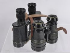 Two Vintage Binoculars, the first a Bino Prism No. 2 MKII x 6 No. 212586, the second a pair of field