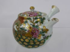 A Japanese Miniature Banko Ware Tea Pot, with character marks to lid.