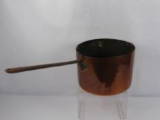 A Large Antique Fireside Copper Pot/Kettle, with cast iron handles, approx 33 diameter.