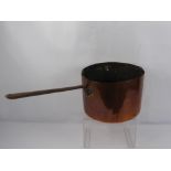 A Large Antique Fireside Copper Pot/Kettle, with cast iron handles, approx 33 diameter.