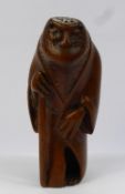 A Meiji Period Japanese Box Wood Netsuke, depicting a salamander wearing robes, beautifully carved