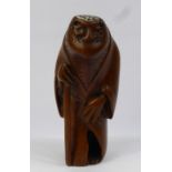 A Meiji Period Japanese Box Wood Netsuke, depicting a salamander wearing robes, beautifully carved