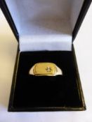 A 9ct Gold and diamond Gentleman’s ring, size X, approx 2.4 gms