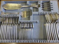 A Three Tier Oak Cased Set of Silver Plated Flatware, not entirely complete.