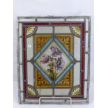 Four Lead Lined Stained Glass Panels, hand painted. Panel 1 depicting daffodils, panel 2 iris, panel