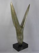 A Contemporary Sculpture, of naturalistic form, approx 66 cms (ex plinth), supported on slate